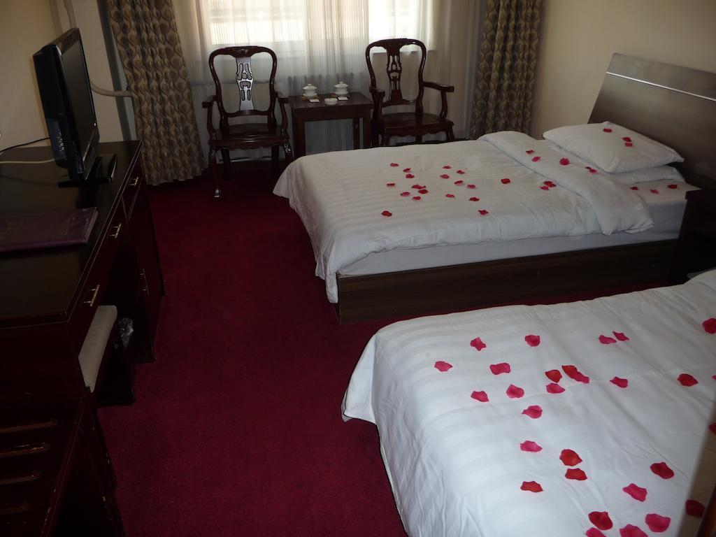 Gan Jin Hotel Tianjin Chambre photo